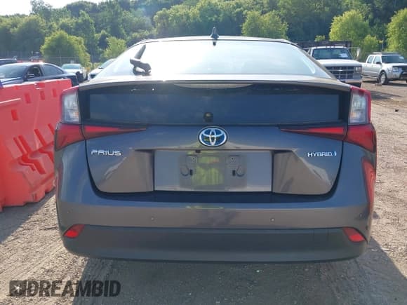 ✅ 2021 Toyota Prius L Eco • VIN: JTDKAMFU2M3147335 • Lot: 42652103. Listed on IAAI with 122,658 mi. Free auction sales archive from the USA and detailed vehicle history report at DreamBid. Image 16.
