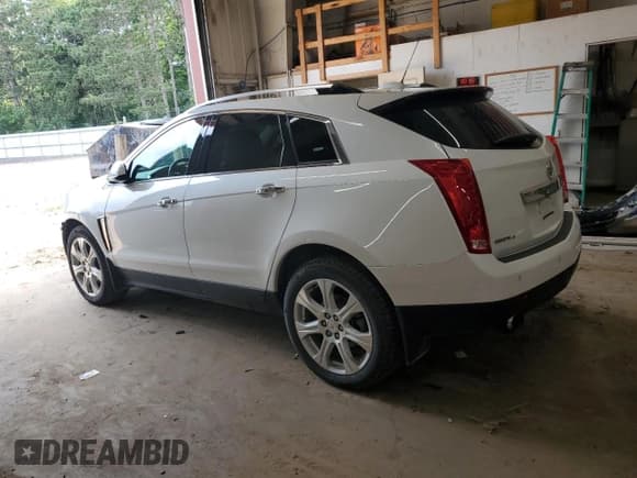 ✅ 2016 Cadillac SRX Premium Collection • VIN: 3GYFNDE34GS552894 • Lot: 64945985. Listed on Copart with 105,751 mi. Free auction sales archive from the USA and detailed vehicle history report at DreamBid. Image 2.
