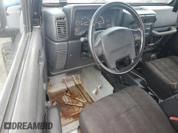 ✅ 2003 Jeep Wrangler Rubicon • VIN: 1J4FA69S53P340085 • Lot: 74564574. Listed on Copart with Not provided. Free auction sales archive from the USA and detailed vehicle history report at DreamBid. Image 8.