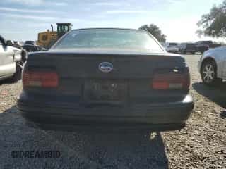 1994 Chevrolet Caprice LS z VIN 1G1BN52P4RR175290, wystawiony jako Copart lot #46079514 z przebiegiem 173 289 mil mil oraz Szkoda całkowita • Salvage title. Historia ofert i sprzedaży dostępna na DreamBid. Obrazek 6.