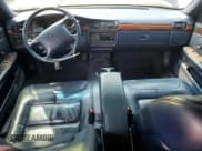 ✅ 1997 Cadillac DeVille • VIN: 1G6KD54Y2VU264494 • Lot: 67474365. Listed on Copart with 142,504 mi. Free auction sales archive from the USA and detailed vehicle history report at DreamBid. Image 8.