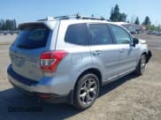 ✅ 2016 Subaru Forester Touring • VIN: JF2SJAXC4GH564016 • Lot: 42408444. Listed on IAAI with 34,506 mi. Free auction sales archive from the USA and detailed vehicle history report at DreamBid. Image 4.