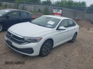 ✅ 2022 Volkswagen Jetta S • VIN: 3VWCM7BU5NM000457 • Lot: 42918018. Wystawiony na IAAI z przebiegiem 23 025 mil. Bezpłatny archiwum sprzedaży aukcyjnych z USA i szczegółowy raport historii pojazdu na DreamBid. Zdjęcie 17.