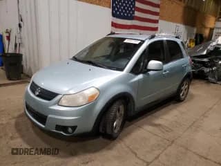 ✅ 2009 Suzuki SX4 Touring AWD • VIN: JS2YB417196201437 • Lot: 89897745. Wystawiony na Copart z przebiegiem 134 659 mil. Bezpłatny archiwum sprzedaży aukcyjnych z USA i szczegółowy raport historii pojazdu na DreamBid. Zdjęcie 1.