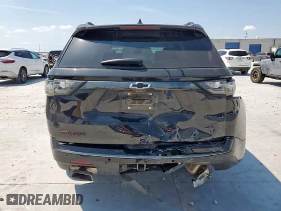 2021 Chevrolet Traverse Premier с VIN 1GNERKKW8MJ225170, выставлен на аукционе Copart как лот 71836345 с пробегом 55 652 миль миль и Списание • Salvage title. История ставок и продаж доступна на DreamBid. Изображение 6.