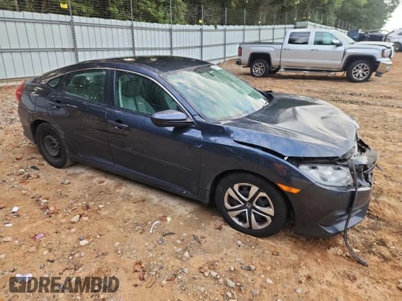 ✅ 2016 Honda Civic LX • VIN: 19XFC2F52GE034524 • Lot: 84631585. Listed on Copart with 124,514 mi. Free auction sales archive from the USA and detailed vehicle history report at DreamBid. Image 4.