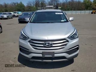 ✅ 2018 Hyundai Santa Fe 2.4L • VIN: 5XYZT3LBXJG569799 • Лот: 60612254. Опубликован ранее на Copart с пробегом 94 415 миль. Бесплатный доступ к архиву аукционных продаж из США и подробный отчёт об истории автомобиля на DreamBid. Изображение 5.