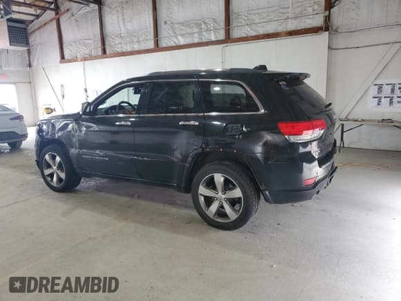 ✅ 2014 Jeep Grand Cherokee Overland • VIN: 1C4RJFCG6EC340078 • Lot: 71419015. Listed on Copart with 125,419 mi. Free auction sales archive from the USA and detailed vehicle history report at DreamBid. Image 2.