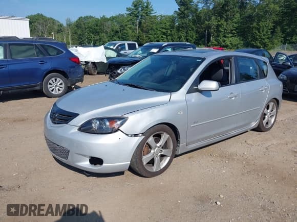 ✅ 2005 Mazda 3 s • VIN: JM1BK143351260133 • Lot: 42947331. Listed on IAAI with 158,209 mi. Free auction sales archive from the USA and detailed vehicle history report at DreamBid. Image 2.