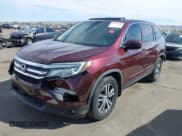 ✅ 2017 Honda Pilot EX-L • VIN: 5FNYF5H71HB027558 • Lot: 41910670. Listed on IAAI with 122,214 mi. Free auction sales archive from the USA and detailed vehicle history report at DreamBid. Image 18.