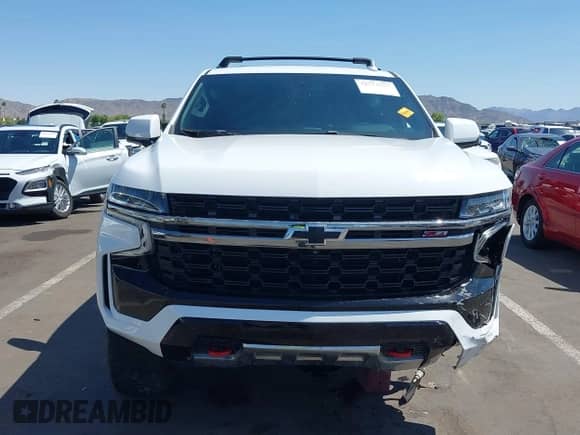 2022 Chevrolet Tahoe Z71 z VIN 1GNSKPKD1NR158062, wystawiony jako IAAI lot #42576884 z przebiegiem 51 083 mil mil oraz . Historia ofert i sprzedaży dostępna na DreamBid. Obrazek 13.