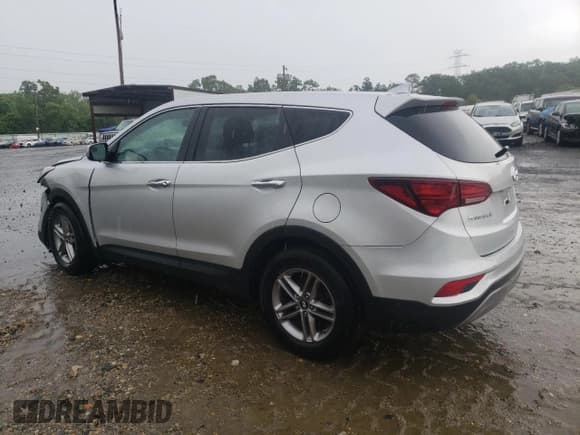 ✅ 2017 Hyundai Santa Fe 2.4L • VIN: 5XYZTDLB7HG438832 • Лот: 56296393. Опубликован ранее на Copart с пробегом 99 528 миль. Бесплатный доступ к архиву аукционных продаж из США и подробный отчёт об истории автомобиля на DreamBid. Изображение 2.