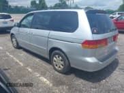 ✅ 2002 Honda Odyssey EX-L • VIN: 5FNRL18932B050435 • Lot: 42770328. Listed on IAAI with 222,717 mi. Free auction sales archive from the USA and detailed vehicle history report at DreamBid. Image 3.