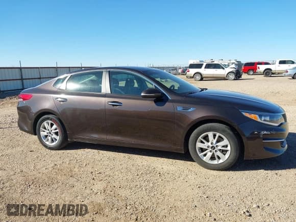 ✅ 2018 Kia Optima LX • VIN: KNAGT4L39J5233301 • Lot: 43641769. Listed on IAAI with 137,087 mi. Free auction sales archive from the USA and detailed vehicle history report at DreamBid. Image 13.