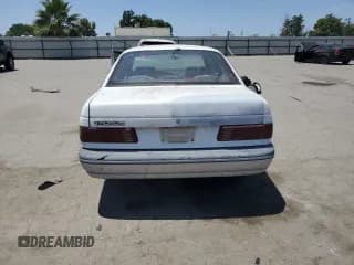✅ 1989 Ford Taurus GL • VIN: 1FABP52UXKG244224 • Лот: 59239225. Опубликован ранее на Copart с пробегом 30 853 миль. Бесплатный доступ к архиву аукционных продаж из США и подробный отчёт об истории автомобиля на DreamBid. Изображение 6.