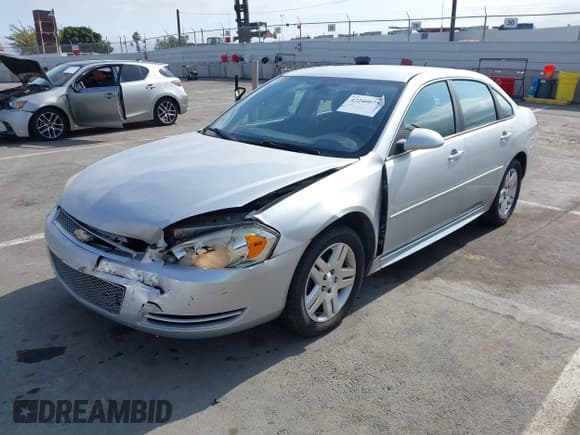 ✅ 2014 Chevrolet Impala LT • VIN: 2G1WB5E31E1100066 • Lot: 42240075. Listed on IAAI with 175,209 mi. Free auction sales archive from the USA and detailed vehicle history report at DreamBid. Image 6.