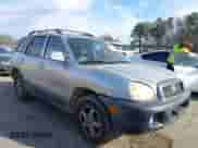 2004 Hyundai Santa Fe GLS z VIN KM8SC13EX4U799955, wystawiony jako IAAI lot #41240442 z przebiegiem 281 394 mil mil oraz . Historia ofert i sprzedaży dostępna na DreamBid. Obrazek 1.