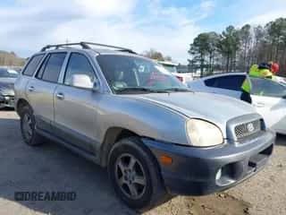 2004 Hyundai Santa Fe GLS z VIN KM8SC13EX4U799955, wystawiony jako IAAI lot #41240442 z przebiegiem 281 394 mil mil oraz . Historia ofert i sprzedaży dostępna na DreamBid. Obrazek 1.