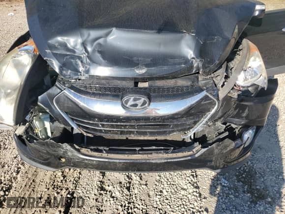 2011 Hyundai Tucson GLS z VIN KM8JU3AC0BU142391, wystawiony jako Copart lot #77628954 z przebiegiem 117 081 mil mil oraz Szkoda całkowita • Salvage title. Historia ofert i sprzedaży dostępna na DreamBid. Obrazek 12.