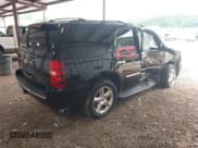 ✅ 2013 Chevrolet Tahoe LTZ • VIN: 1GNSCCE03DR122449 • Lot: 42860317. Listed on IAAI with 181,518 mi. Free auction sales archive from the USA and detailed vehicle history report at DreamBid. Image 4.