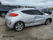 ✅ 2013 Hyundai Veloster w/Gray Int • VIN: KMHTC6AD5DU150401 • Lot: 70595914. Wystawiony na Copart z przebiegiem 140 541 mil. Bezpłatny archiwum sprzedaży aukcyjnych z USA i szczegółowy raport historii pojazdu na DreamBid. Zdjęcie 3.