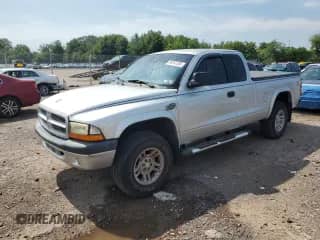 2001 Dodge Dakota Sport with VIN 1B7GG22N01S152414, listed as a Copart auction lot 66342335 with 147,060 mi miles and Salvage title. Bid and sale history available at DreamBid. Image 1.
