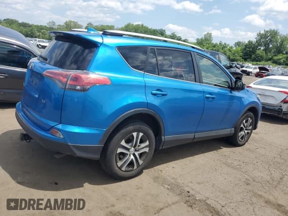 ✅ 2017 Toyota RAV4 LE • VIN: JTMZFREV2HJ104106 • Лот: 61797715. Опубликован ранее на Copart с пробегом 267 448 миль. Бесплатный доступ к архиву аукционных продаж из США и подробный отчёт об истории автомобиля на DreamBid. Изображение 3.