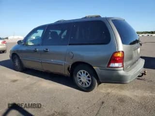 ✅ 2001 Ford Windstar LX • VIN: 2FMZA51441BA35669 • Лот: 73283214. Опубликован ранее на Copart с пробегом 240 538 миль. Бесплатный доступ к архиву аукционных продаж из США и подробный отчёт об истории автомобиля на DreamBid. Изображение 2.