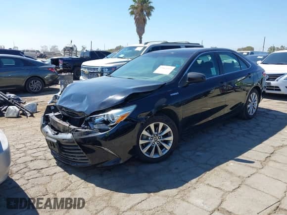 2015 Toyota Camry LE with VIN 4T1BD1FK1FU159313, listed as a IAAI auction lot 42862113 with 119,408 mi miles and . Bid and sale history available at DreamBid. Image 2.