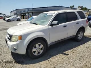 ✅ 2009 Ford Escape XLS • VIN: 1FMCU02799KA14312 • Lot: 65273895. Listed on Copart with 132,337 mi. Free auction sales archive from the USA and detailed vehicle history report at DreamBid. Image 1.