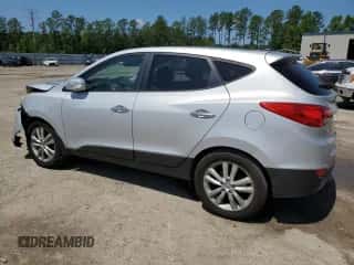 2013 Hyundai Tucson Limited z VIN KM8JUCAC9DU557664, wystawiony jako Copart lot #53707934 z przebiegiem 148 967 mil mil oraz Szkoda całkowita • Salvage title. Historia ofert i sprzedaży dostępna na DreamBid. Obrazek 2.