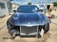 ✅ 2018 BMW 7 Series 750i xDrive • VIN: WBA7B0C59JG527315 • Lot: 69630535. Wystawiony na Copart z przebiegiem 47 063 mil. Bezpłatny archiwum sprzedaży aukcyjnych z USA i szczegółowy raport historii pojazdu na DreamBid. Zdjęcie 5.