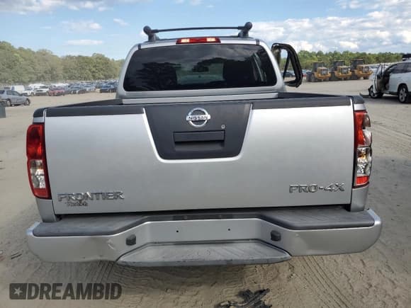 ✅ 2012 Nissan Frontier Pro-4X • VIN: 1N6AD0EV4CC431552 • Lot: 70695865. Listed on Copart with 99,961 mi. Free auction sales archive from the USA and detailed vehicle history report at DreamBid. Image 6.