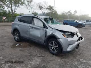 ✅ 2018 Toyota RAV4 XLE • VIN: 2T3WFREV0JW487960 • Lot: 43542649. Listed on IAAI with Not provided. Free auction sales archive from the USA and detailed vehicle history report at DreamBid. Image 1.