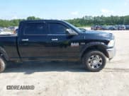 ✅ 2014 Ram 2500 SLT • VIN: 3C6TR5DT4EG217792 • Lot: 42489013. Listed on IAAI with 190,773 mi. Free auction sales archive from the USA and detailed vehicle history report at DreamBid. Image 13.