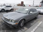✅ 2006 Jaguar XJ Vanden Plas • VIN: SAJWA82B76SH10941 • Лот: 42159262. Опубликован ранее на IAAI с пробегом 134 886 миль. Бесплатный доступ к архиву аукционных продаж из США и подробный отчёт об истории автомобиля на DreamBid. Изображение 2.