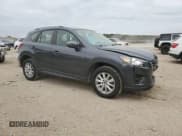 ✅ 2016 Mazda CX-5 Sport • VIN: JM3KE4BY4G0626334 • Lot: 86323225. Listed on Copart with 96,022 mi. Free auction sales archive from the USA and detailed vehicle history report at DreamBid. Image 4.