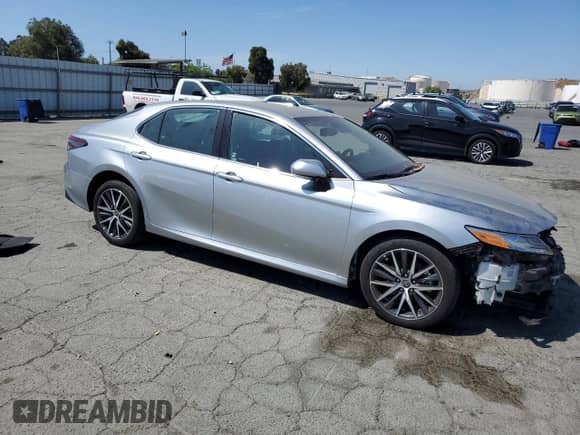 2023 Toyota Camry Hybrid XLE with VIN 4T1F31AK2PU617244, listed as a Copart auction lot 68340875 with 35,063 mi miles and Salvage title. Bid and sale history available at DreamBid. Image 4.