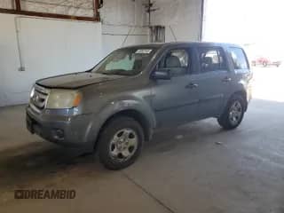 2009 Honda Pilot LX with VIN 5FNYF38259B010692, listed as a Copart auction lot 70282145 with 302,395 mi miles and Salvage title. Bid and sale history available at DreamBid. Image 1.