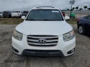 ✅ 2012 Hyundai Santa Fe Limited • VIN: 5XYZKDAG1CG143185 • Lot: 74531934. Listed on Copart with 186,312 mi. Free auction sales archive from the USA and detailed vehicle history report at DreamBid. Image 5.