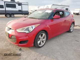 2015 Hyundai Veloster with VIN KMHTC6ADXFU236130, listed as a IAAI auction lot 43521374 with 131,213 mi miles and . Bid and sale history available at DreamBid. Image 2.
