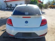 ✅ 2016 Volkswagen Beetle Dune • VIN: 3VWS17AT8GM632868 • Lot: 43810321. Listed on IAAI with 75,311 mi. Free auction sales archive from the USA and detailed vehicle history report at DreamBid. Image 17.