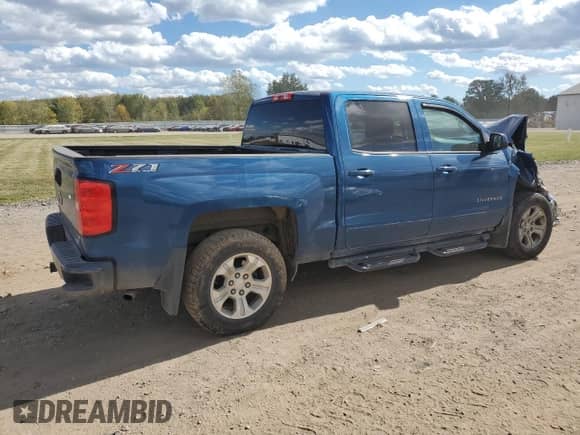 2018 Chevrolet Silverado 1500 LT с VIN 3GCUKREC8JG216937, выставлен на аукционе Copart как лот 85321435 с пробегом 119 068 миль миль и Списание • Salvage title. История ставок и продаж доступна на DreamBid. Изображение 3.