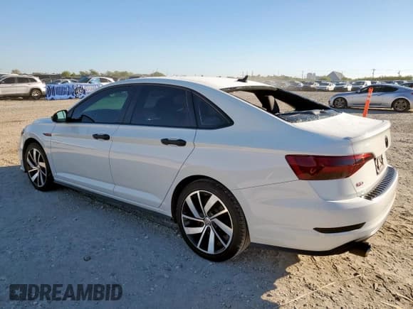 ✅ 2021 Volkswagen Jetta S • VIN: 3VW5T7BU1MM104485 • Lot: 91599875. Listed on Copart with 82,512 mi. Free auction sales archive from the USA and detailed vehicle history report at DreamBid. Image 2.