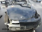 ✅ 2023 Tesla Model Y Long Range • VIN: 7SAYGAEE0PF621018 • Лот: 92168355. Опубликован ранее на Copart с пробегом Не указан. Бесплатный доступ к архиву аукционных продаж из США и подробный отчёт об истории автомобиля на DreamBid. Изображение 12.