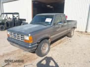 ✅ 1991 Ford Ranger XLT • VIN: 1FTCR15X5MPA41574 • Лот: 43295087. Опубликован ранее на IAAI с пробегом 283 075 миль. Бесплатный доступ к архиву аукционных продаж из США и подробный отчёт об истории автомобиля на DreamBid. Изображение 2.