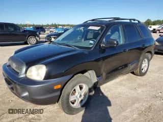 2003 Hyundai Santa Fe GLS z VIN KM8SC13D33U439982, wystawiony jako Copart lot #81414724 z przebiegiem 107 977 mil mil oraz Czysty tytuł • Clean title. Historia ofert i sprzedaży dostępna na DreamBid. Obrazek 1.