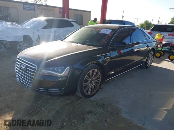 ✅ 2013 Audi A8 4.0L • VIN: WAUR2AFD0DN018666 • Lot: 43576383. Wystawiony na IAAI z przebiegiem 171 267 mil. Bezpłatny archiwum sprzedaży aukcyjnych z USA i szczegółowy raport historii pojazdu na DreamBid. Zdjęcie 19.