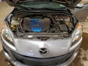 ✅ 2012 Mazda 3 i Touring • VIN: JM1BL1V75C1522343 • Лот: 94863105. Опубликован ранее на Copart с пробегом 128 460 миль. Бесплатный доступ к архиву аукционных продаж из США и подробный отчёт об истории автомобиля на DreamBid. Изображение 11.