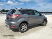 ✅ 2014 Ford Escape Titanium • VIN: 1FMCU0J95EUB23559 • Лот: 85117825. Опубликован ранее на Copart с пробегом 201 788 миль. Бесплатный доступ к архиву аукционных продаж из США и подробный отчёт об истории автомобиля на DreamBid. Изображение 3.